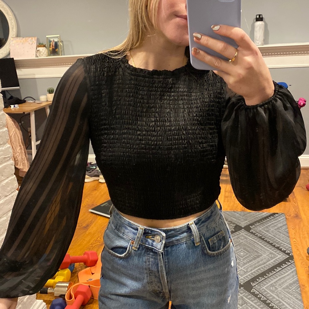 Storia black ruffled blouse with sheer arms